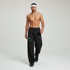 MONROE STORE black fleece sweatpants with drawstring, straight leg, and green 'Waacking Dance' and 'Disco' graphics.