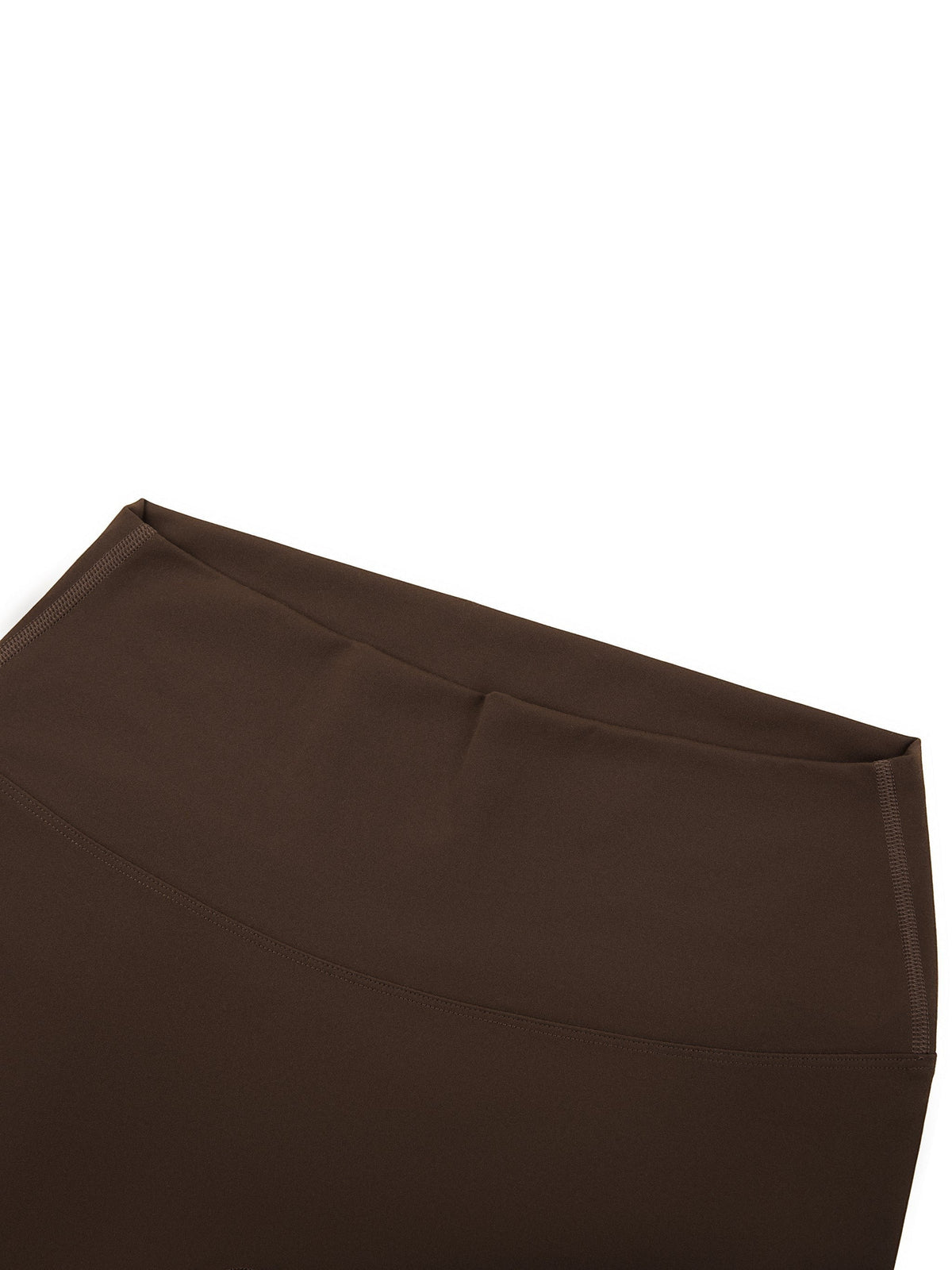 MONROE STORE high-waisted brown yoga leggings with a seamless waistband and flatlock stitching.
